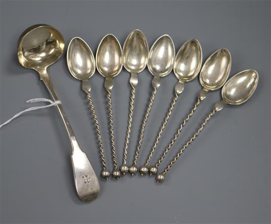 Seven 800 continental white metal spoons and a William IV Scottish silver toddy ladle, Edinburgh, 1832.